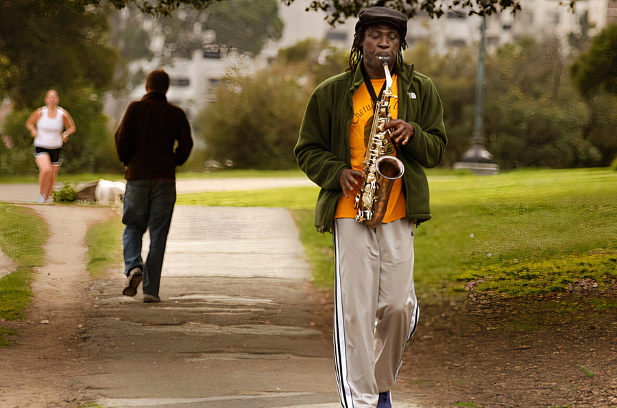 Sax player walking in Oakland