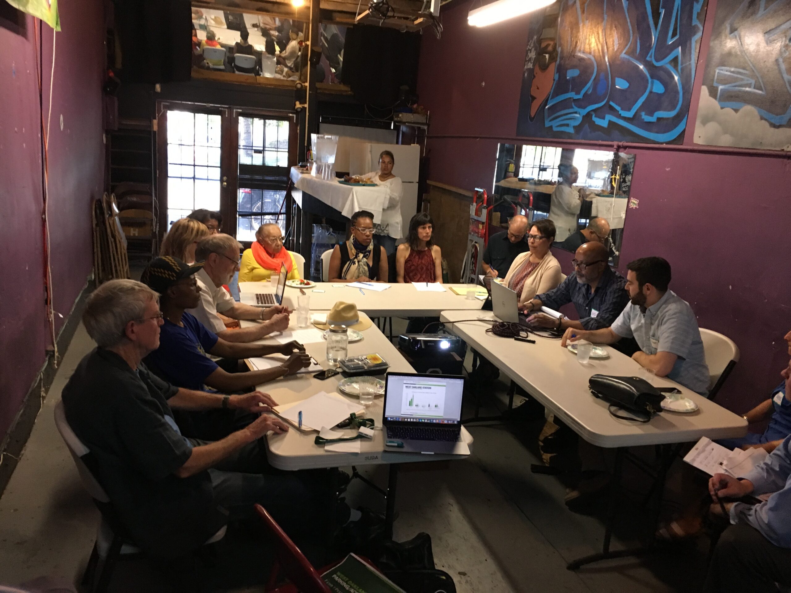 People sitting at U shaped table